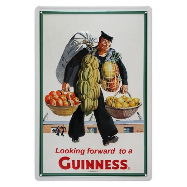 Plaque métal publicitaire 20x30cm bombée en relief : Looking forward to a GUINNESS.