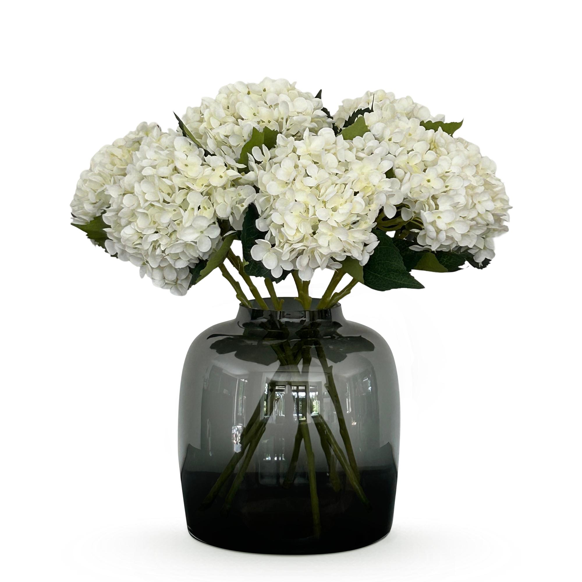 Kunstbloemen Solo en pot. Plante verte type Kunstbloemen Solo, livrée en pot, idéale pour intérieur lumineux.