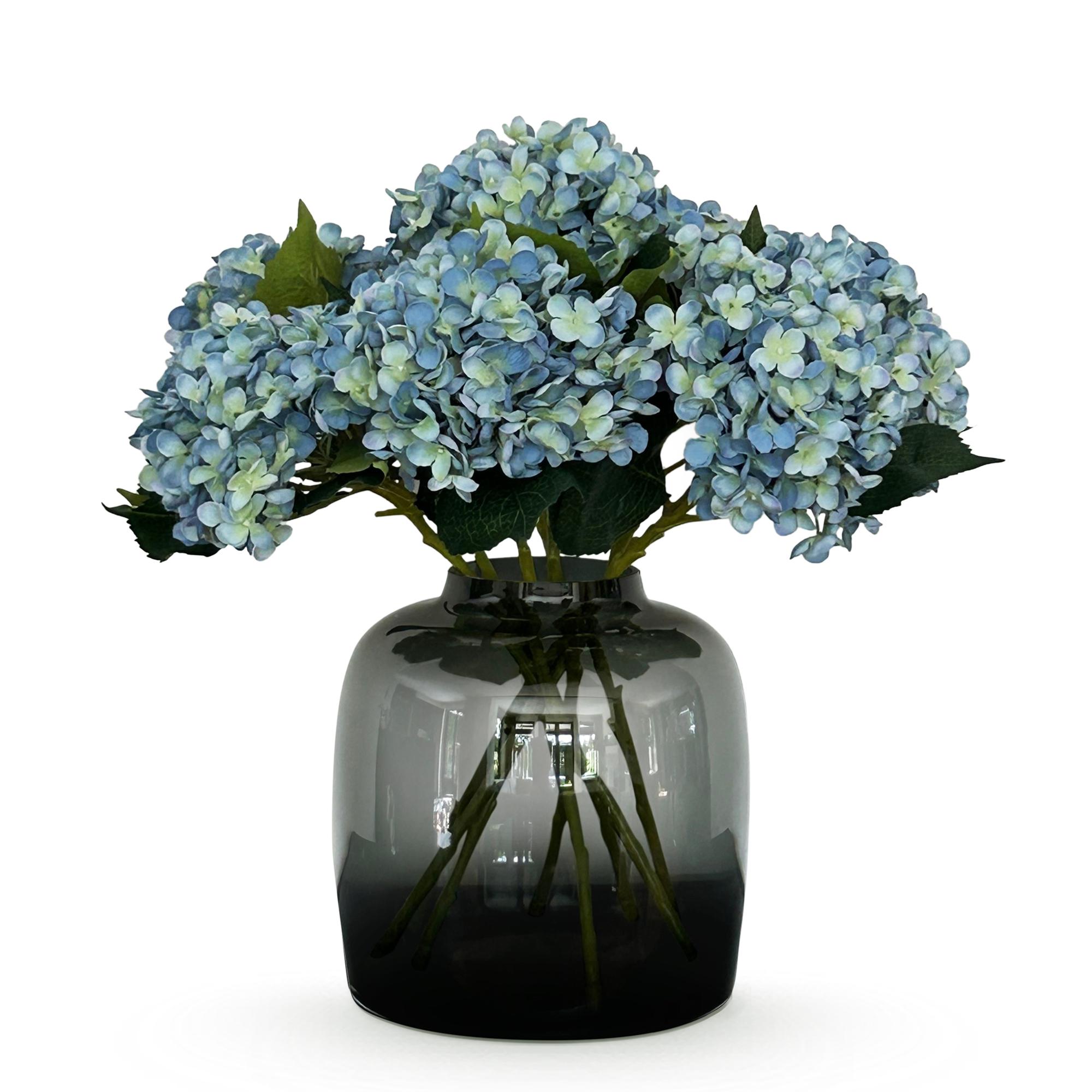 Kunstbloemen Solo en pot. Plante verte type Kunstbloemen Solo, livrée en pot, idéale pour intérieur lumineux.