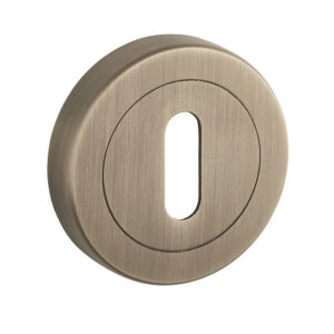 Rosaces de fonction ligne Design DCG - clé L vieux - finition laiton mat - DCG - 628804